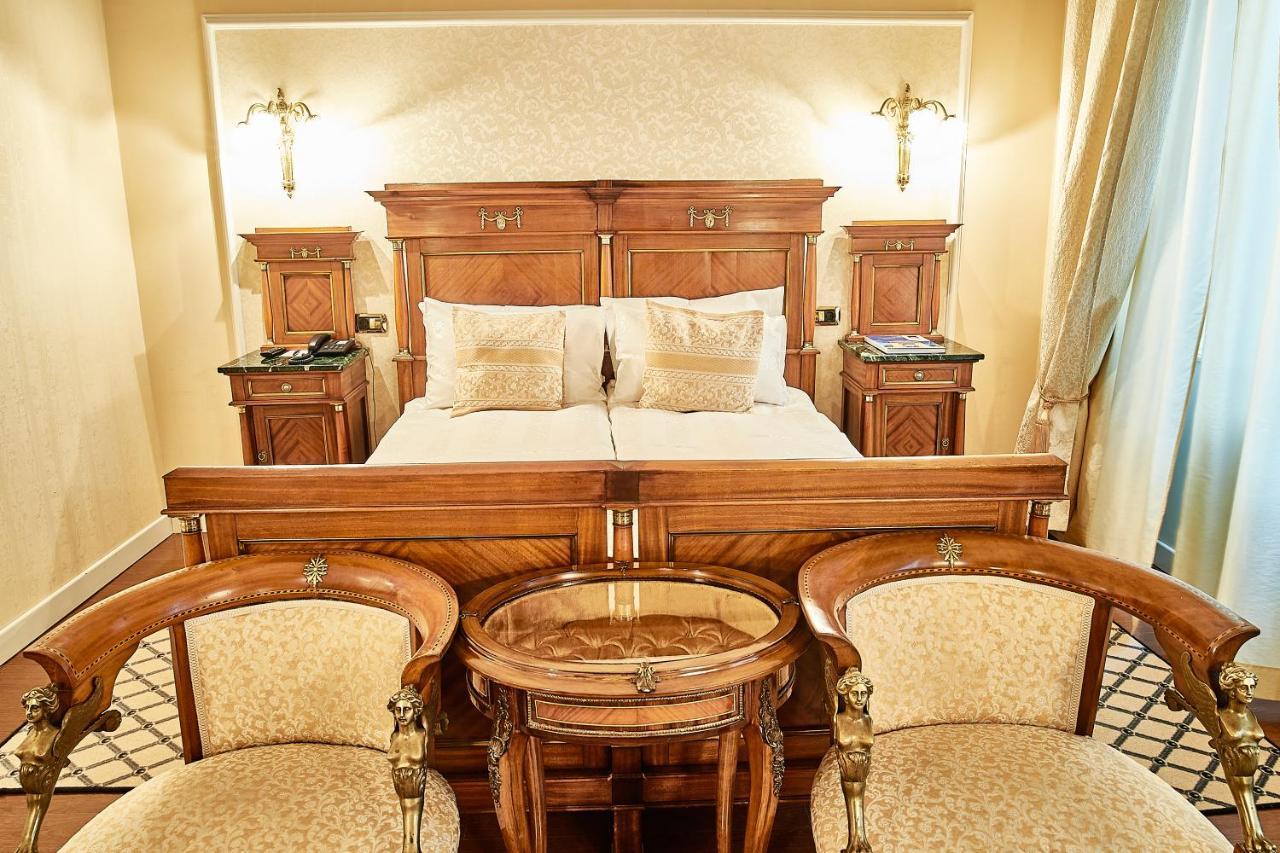แกรนด์ โฮเต็ล คอนติเนนทัล Hotel บูคาเรสต์ ภายนอก รูปภาพ A bedroom at the hotel