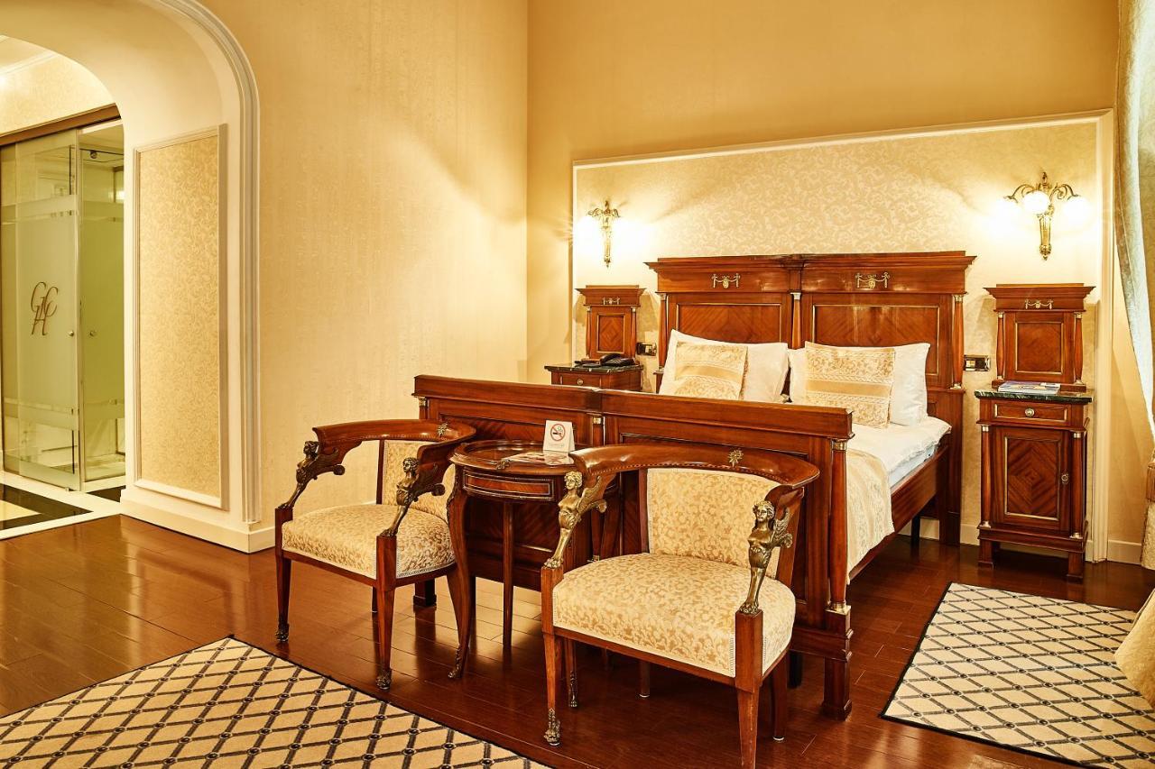 แกรนด์ โฮเต็ล คอนติเนนทัล Hotel บูคาเรสต์ ภายนอก รูปภาพ A bedroom at the hotel
