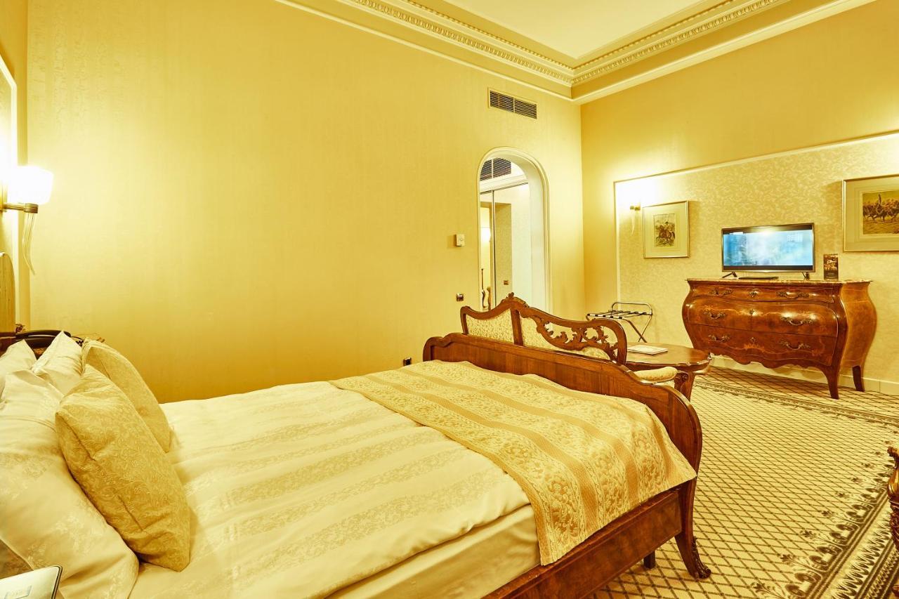 แกรนด์ โฮเต็ล คอนติเนนทัล Hotel บูคาเรสต์ ภายนอก รูปภาพ A bedroom at the Imperial